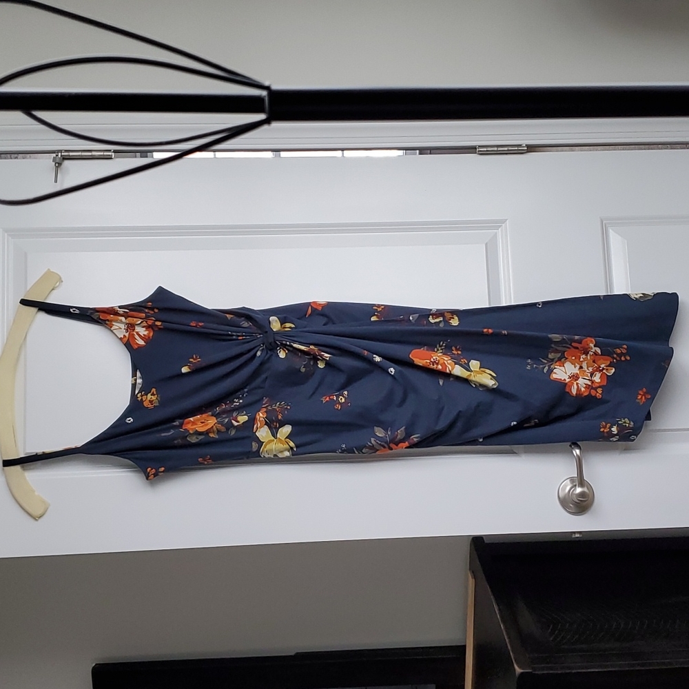 Nine Britton size Large, navy floral dress with knot detail. EUC.